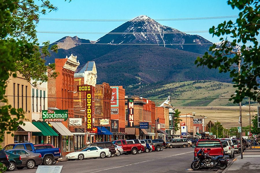 Main Street in Livingston with a snow-capped peak behind
